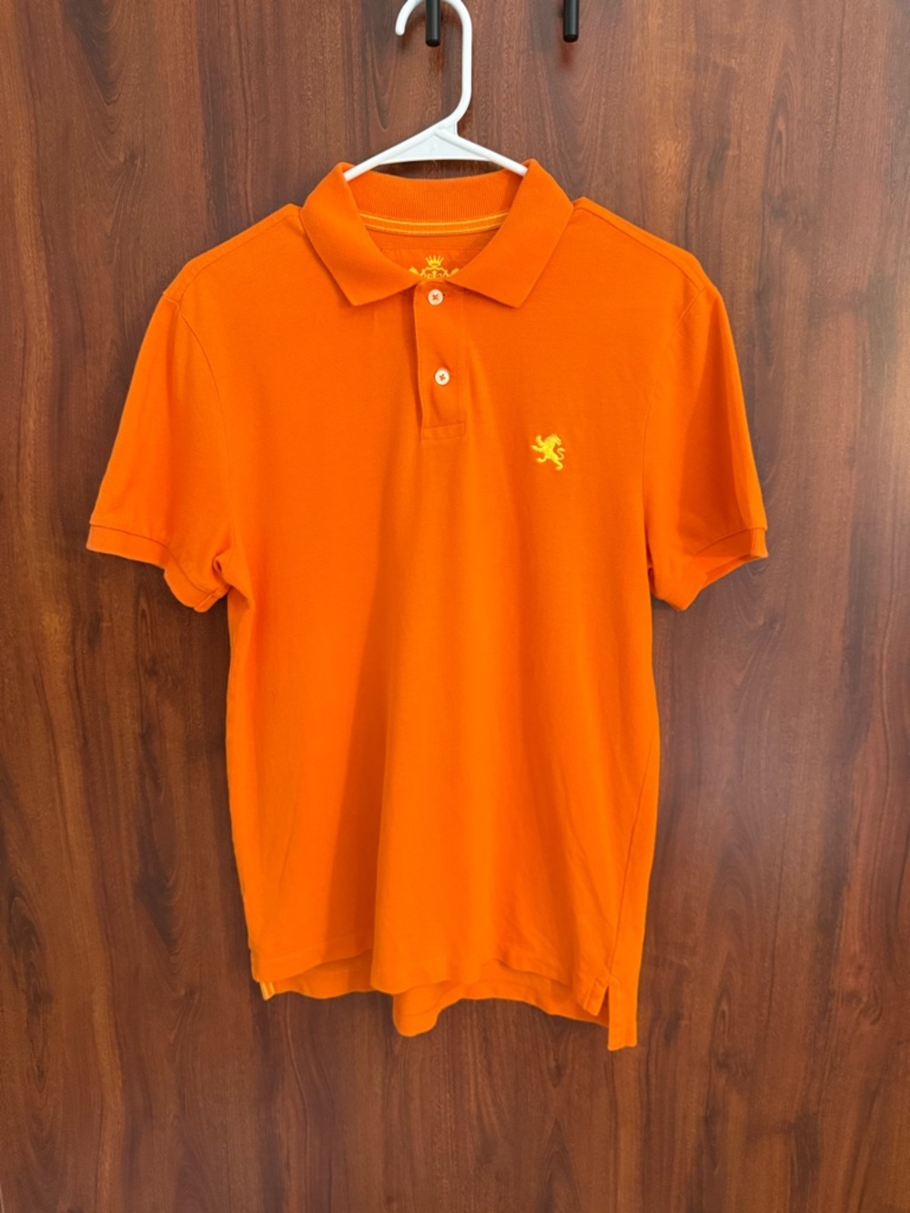 Express Small Lion Polo: Orange with Yellow Logo